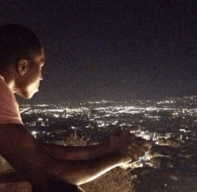 guy-looking-at-city-city.gif