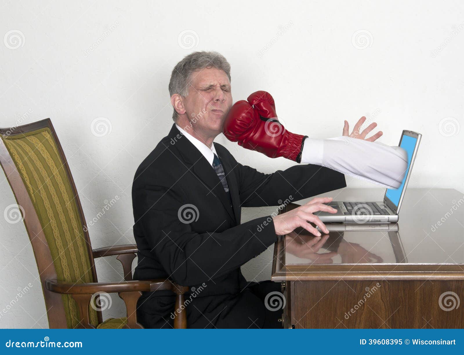 businessman-gets-surprise-punch-laptop-must-be-rough-day-internet-sucker-as-fist-boxing-glove-jumps-out-39608395.jpg