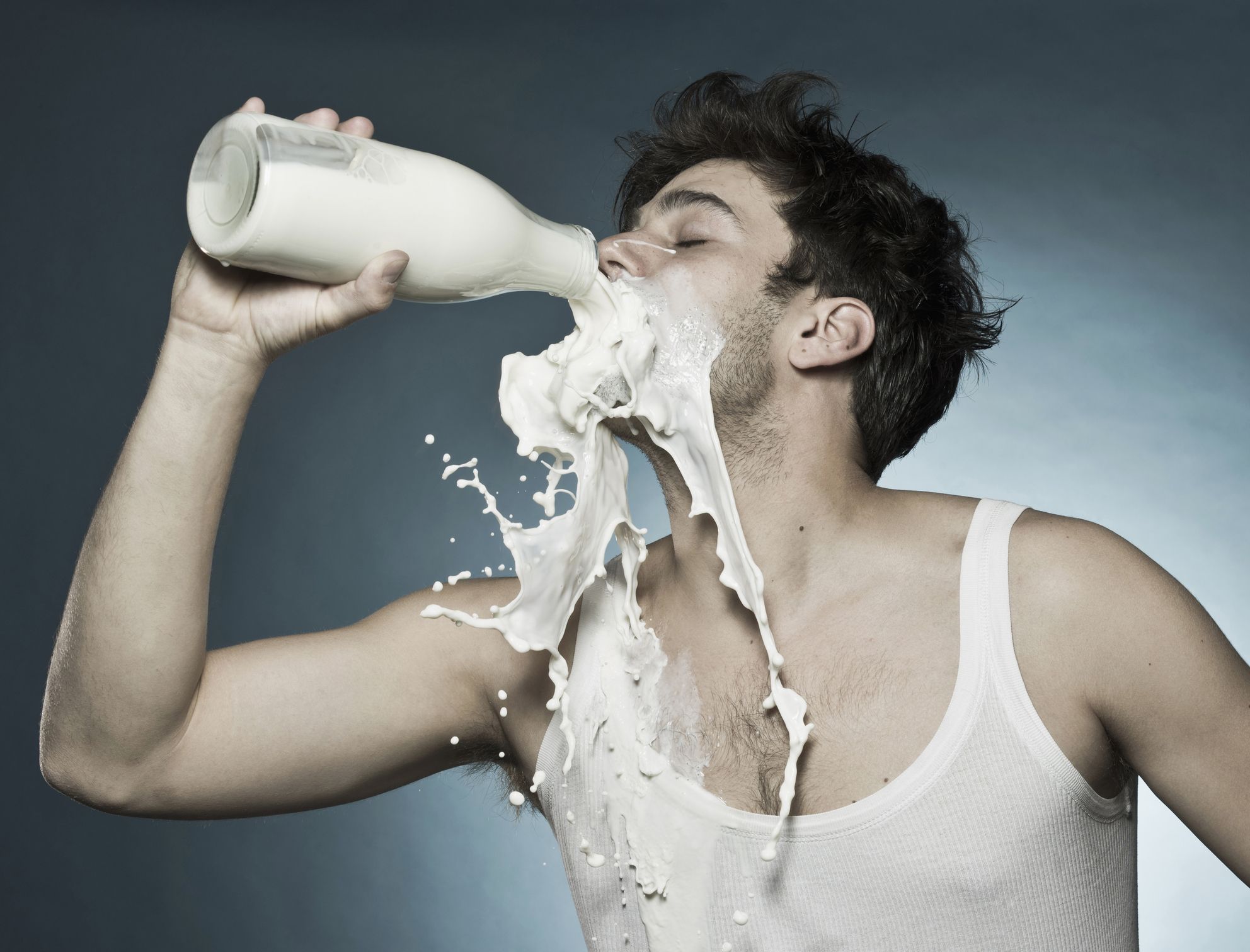 caucasian-man-drinking-milk-and-spilling-it-royalty-free-image-1682504479.jpg