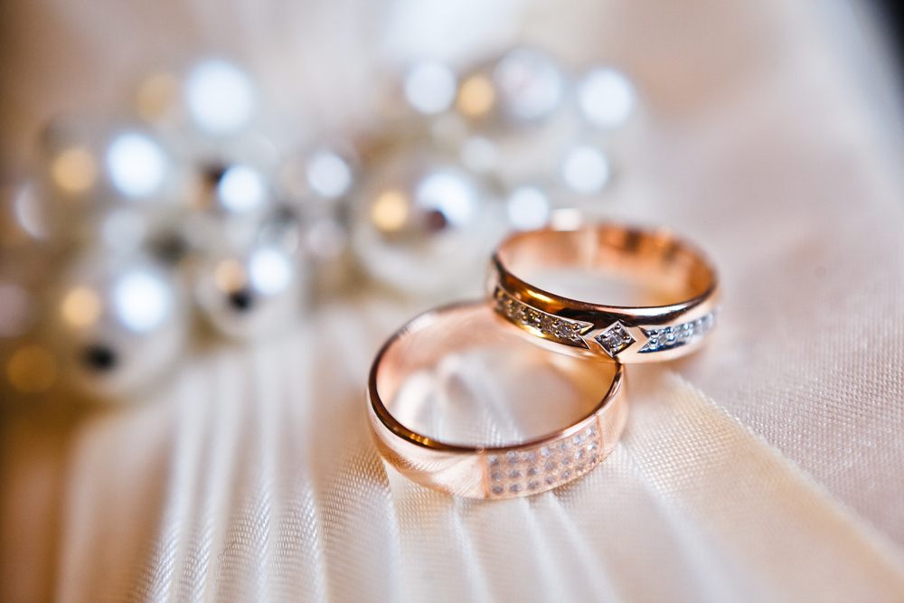 re-gold-wedding-rings-on-the-pincushion.jpg