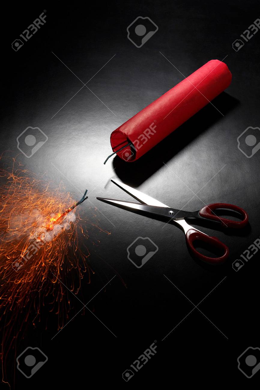 39012398-explosive-with-its-fuse-cut-by-a-scissors.jpg